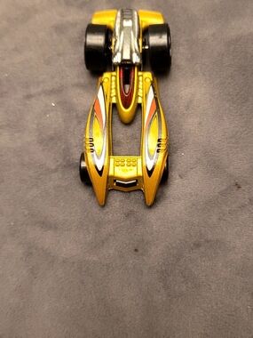 Mattel Gold and Black Streamline Racer Toy Car